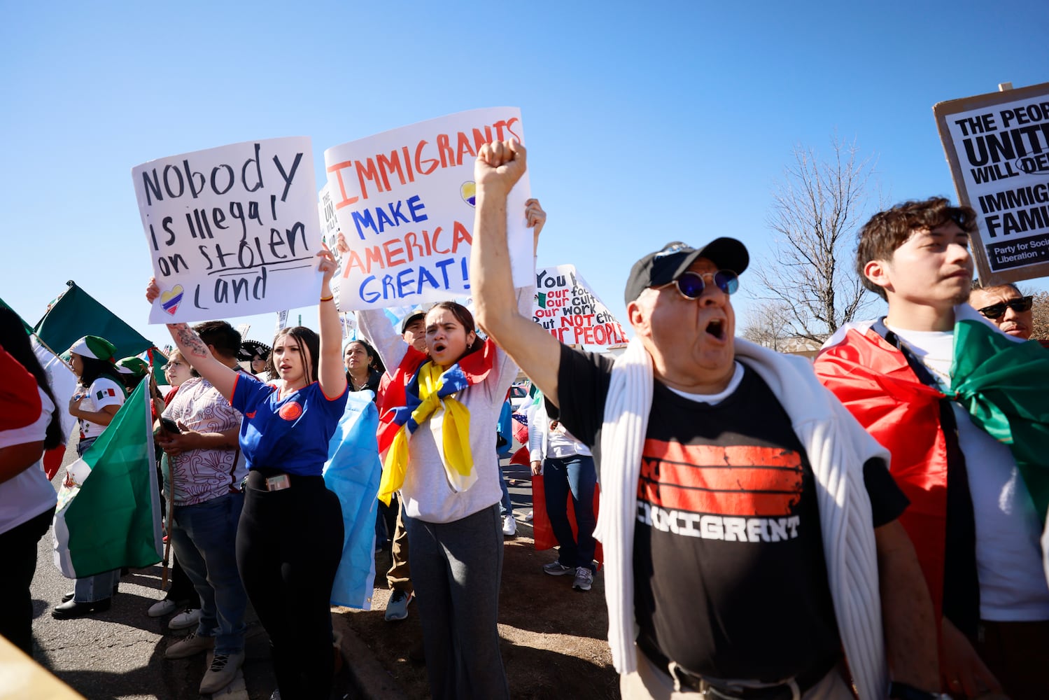 Demonstrators in support of immigrant communities gathered along Buford Highway, waving Latin American flags near Plaza Fiesta on Saturday, February 1, 2025, to protest a recent immigration arrest in Georgia.
(Miguel Martinez/ AJC)
