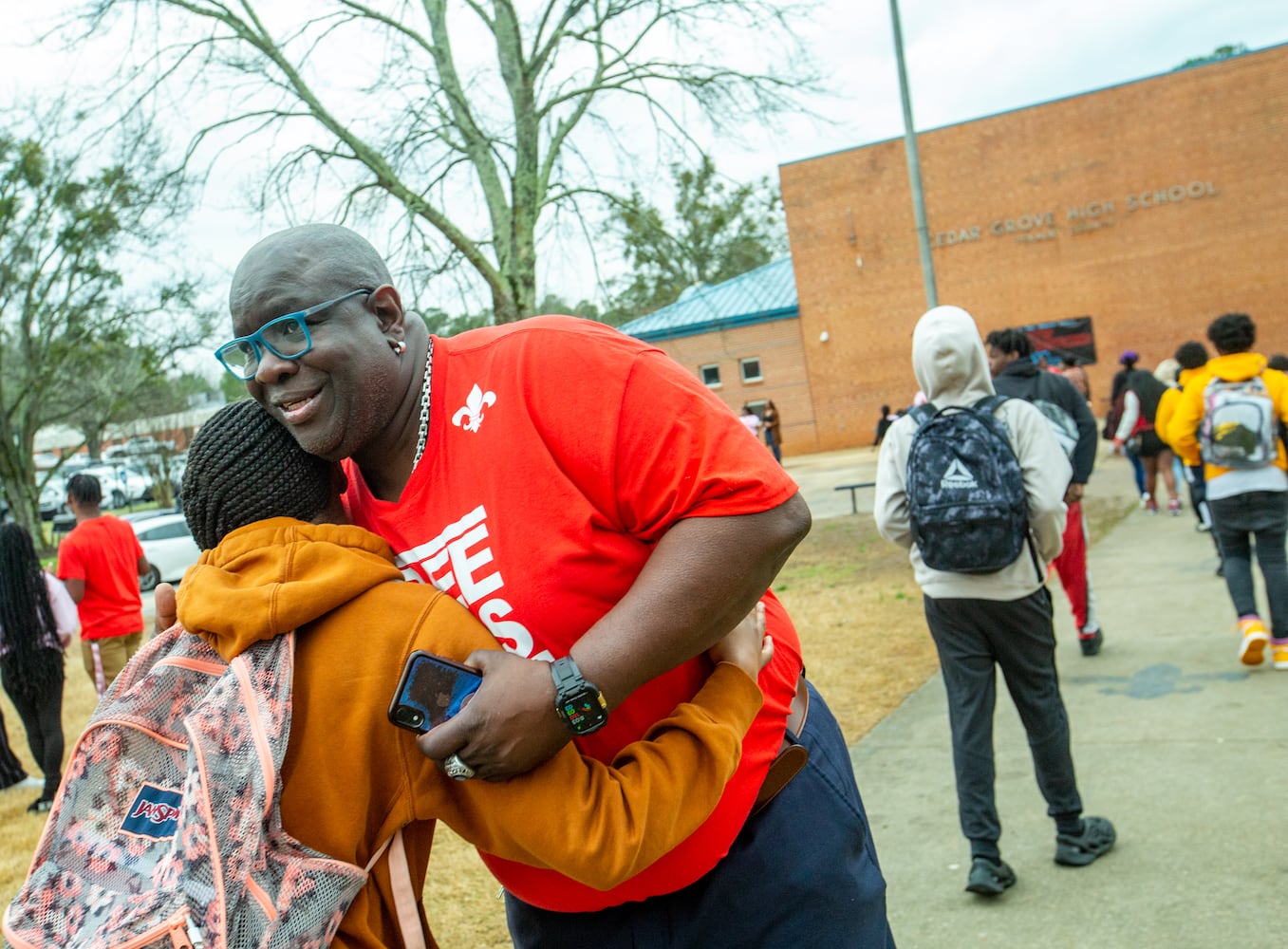 DeKalb County school hugs students every Wednesday on the way in to class