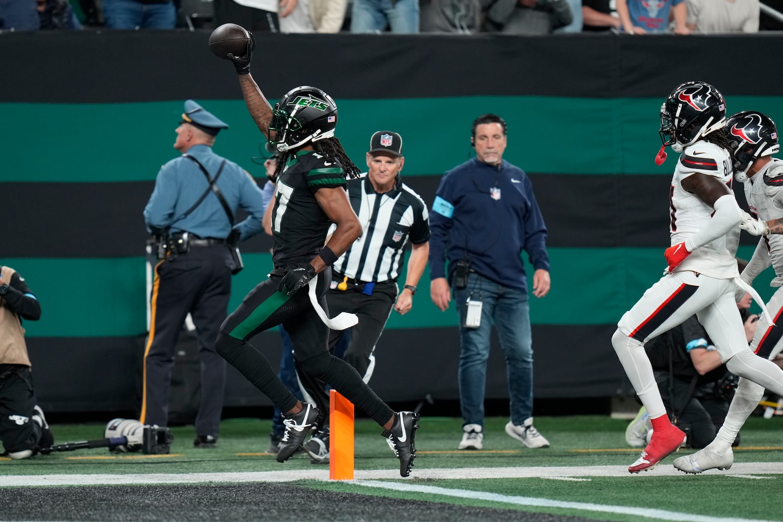 New York Jets wide receiver Davante Adams (17) scores a touchdown during the second half of an NFL football game against the Houston Texans, Thursday, Oct. 31, 2024, in East Rutherford, N.J. (AP Photo/Seth Wenig)