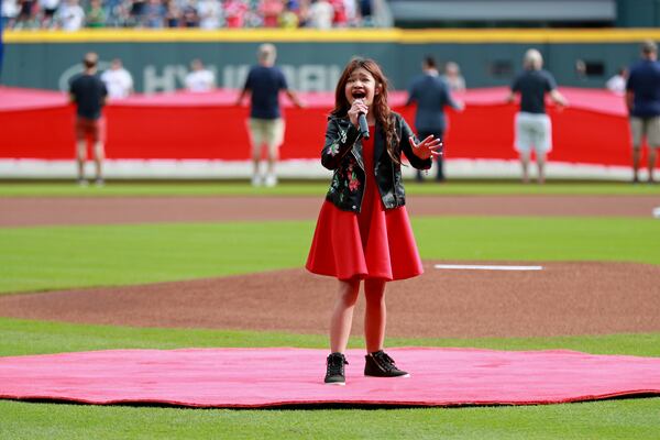 Angelica Hale sings the national anthem before a Braves game in 2018. (Curtis Compton/ccompton@ajc.com)