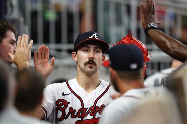 080222 Atlanta: Atlanta Braves starting pitcher Spencer Strider gets high fives all around going 6 2/3 innings against the Philadelphia Phillies during a 13-1 victory in a MLB baseball game on Tuesday, August 2, 2022, in Atlanta.   “Curtis Compton / Curtis Compton@ajc.com