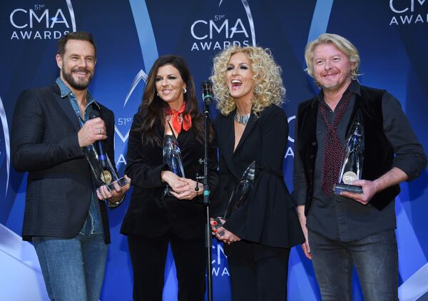  Little Big Town, from left, Jimi Westbrook, Karen Fairchild, Kimberly Schlapman and Phillip Sweet with the award for vocal group of the year. (Photo by Evan Agostini/Invision/AP)