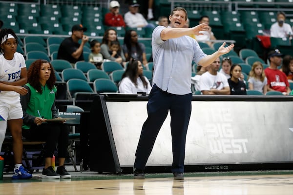 Florida Gulf Coast head coach Karl Smesko gives orders to his team as they take on Stanford during the first quarter of an NCAA college basketball game, Friday, Nov. 25, 2022, in Honolulu. (AP Photo/Marco Garcia)