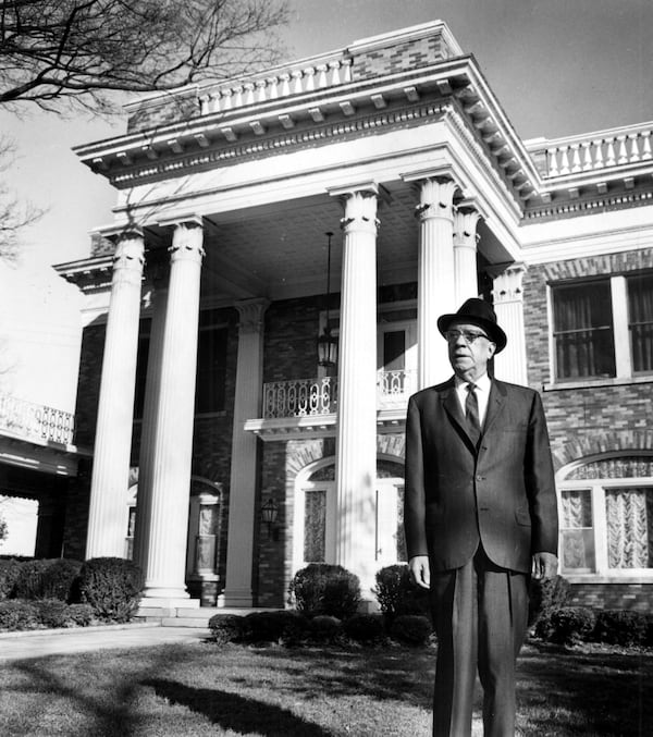 Norris Herndon outside the home that his dad, Alonzo Herndon, built. The house sits on land acquired from Atlanta University. (AJC file) 