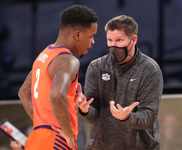 Clemson head coach Brad Brownell instructs guard Al-Amir Dawes during an 83-65 upset loss to Georgia Tech Tuesday, Jan. 20, 2021, at McCamish Pavilion in Atlanta. (Curtis Compton / Curtis.Compton@ajc.com)