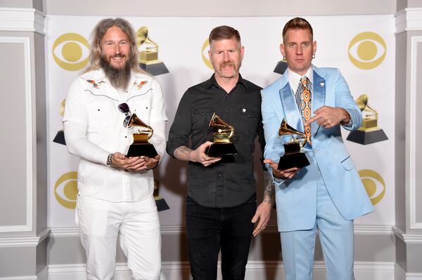  Troy Sanders, Bill Kelliher and Brann Dailor of Mastodon won their first Grammy in January 2018. (Photo by Michael Loccisano/Getty Images for NARAS)