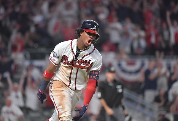 October 3, 2019 Atlanta - Atlanta Braves center fielder Ronald Acuna Jr. hits two run home run in 9th inning during Game 1 of best-of-five National League Division Series at SunTrust Park on Thursday, October 3, 2019. St. Louis Cardinals won 7-6 over the Atlanta Braves. (Hyosub Shin / Hyosub.Shin@ajc.com)