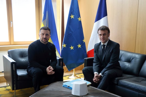 Ukraine's President Volodymyr Zelenskyy, left, meets French President Emmanuel Macron on the sidelines of the European Council to discuss continued support for Ukraine and European defense, in Brussels, Thursday, March 6, 2025. (Ludovic Marin, Pool via AP)