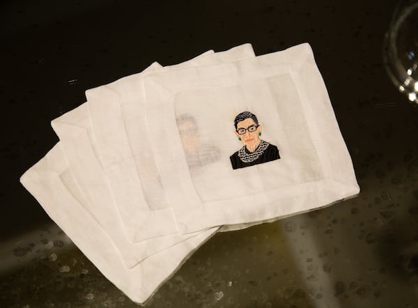 Ruth Bader Ginsburg napkins sit on a coffee table at Eleanor's Place, a private, women-only co-working space in Atlanta Saturday, September 19, 2020.   STEVE SCHAEFER / SPECIAL TO THE AJC 