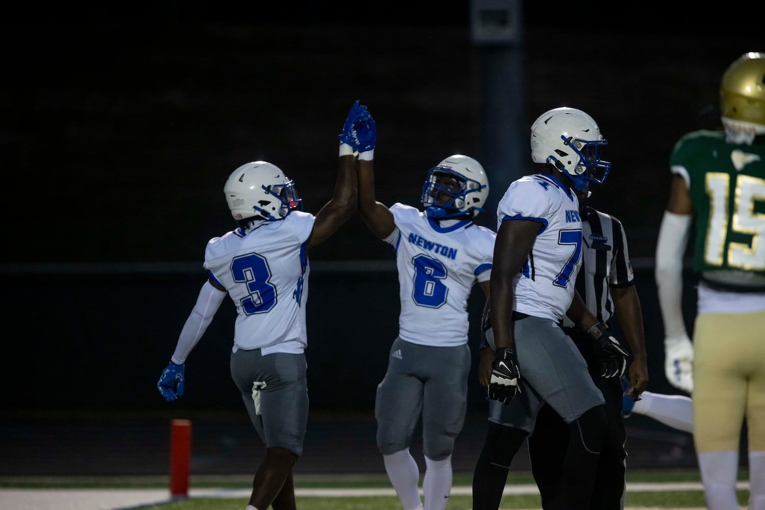 Newton County players celebrate a touchdown during a GHSA High School Football game between Grayson High School and Newton High School at Grayson High School in Lawrenceville, GA., on Friday, September 29, 2023. (Photo/Jenn Finch)