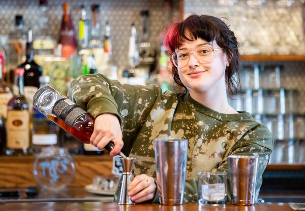 Peyton Howard makes a cocktail at Buteco in the Southern Feedstore food hall. Ryan Fleisher for The Atlanta Journal-Constitution