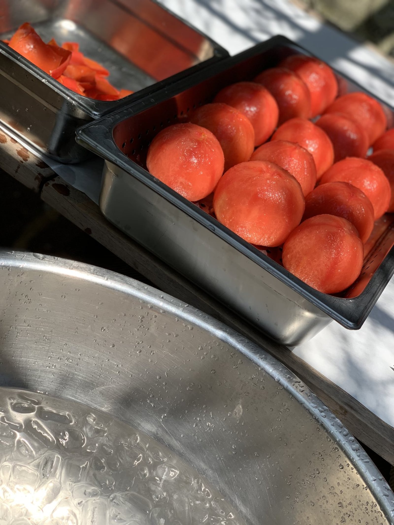 Tomatoes that have been boiled and peeled will soon become Tomato Clove Jam. CONTRIBUTED BY ASHA GOMEZ