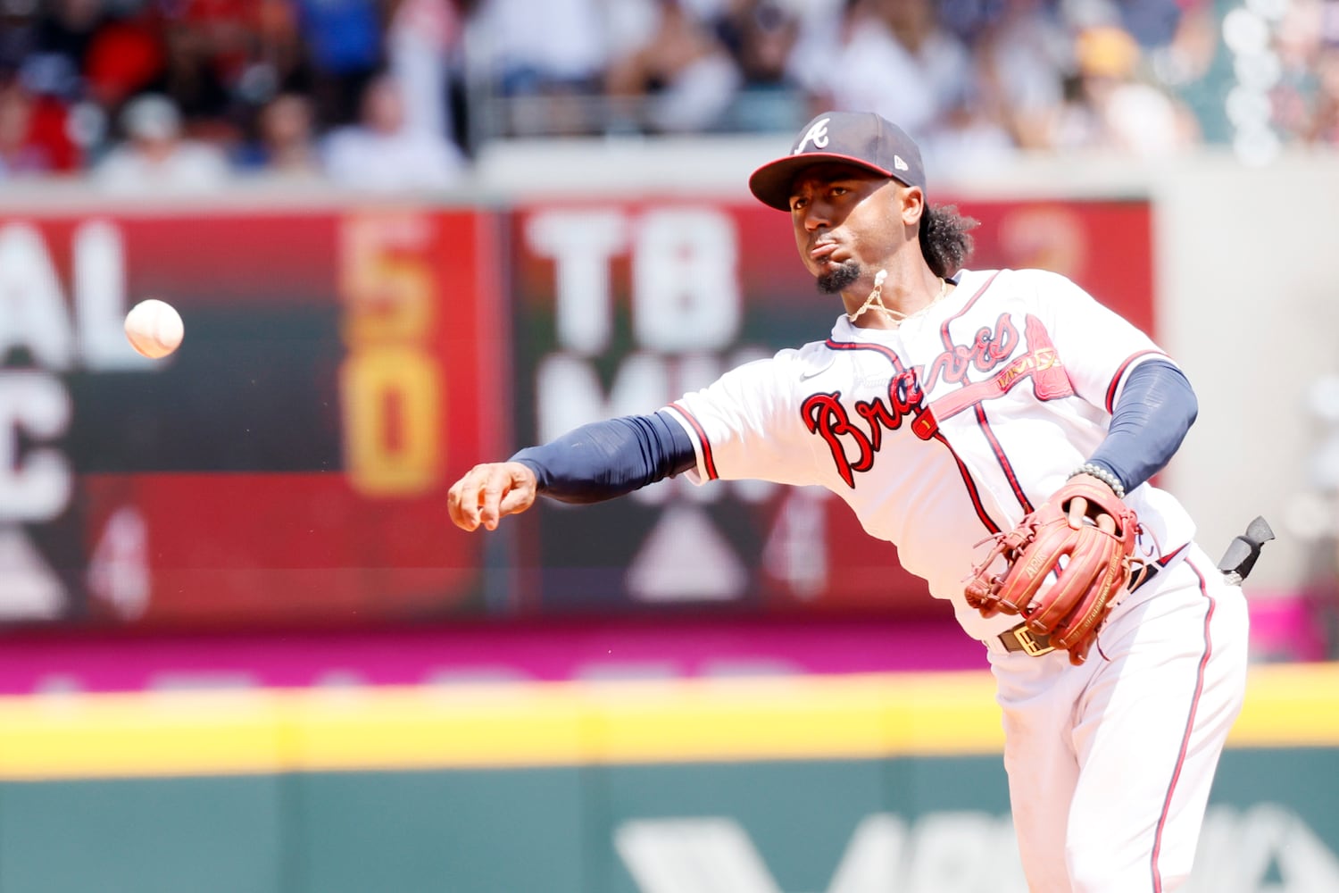 Atlanta second baseman Ozzie Albies throws for an out during the sixth inning Sunday at Truist Park. (Miguel Martinez / miguel.martinezjimenez@ajc.com)