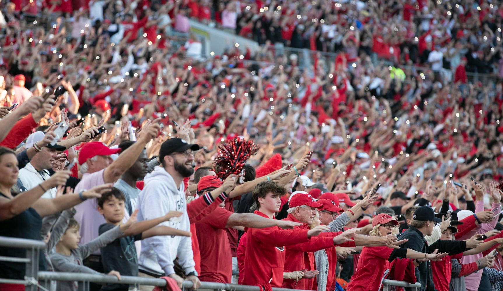 Georgia fans light up the stadium during the start of the 4th quarter during the second half of the annual NCAA Georgia vs Florida game at TIAA Bank Field in Jacksonville. Georgia won 34-7.  Bob Andres / bandres@ajc.com