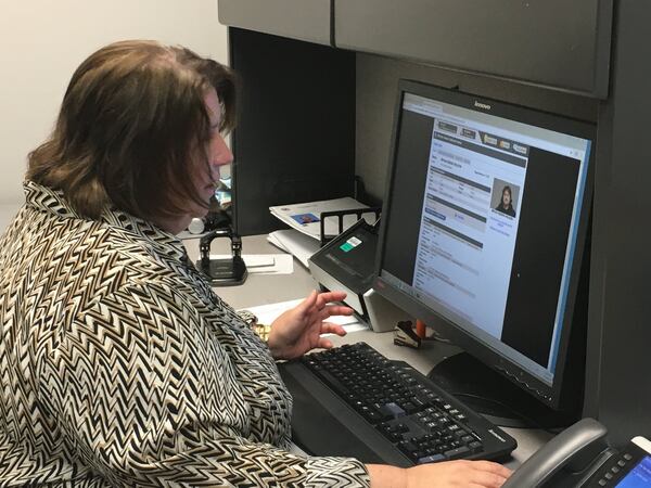 Sgt. Julie Stephens with the Montgomery County Sheriff’s Sex Offender Registration and Notification Unit pulls up registration information at her office at the county jail, Thursday, July 13, 2017. KATIE WEDELL/STAFF