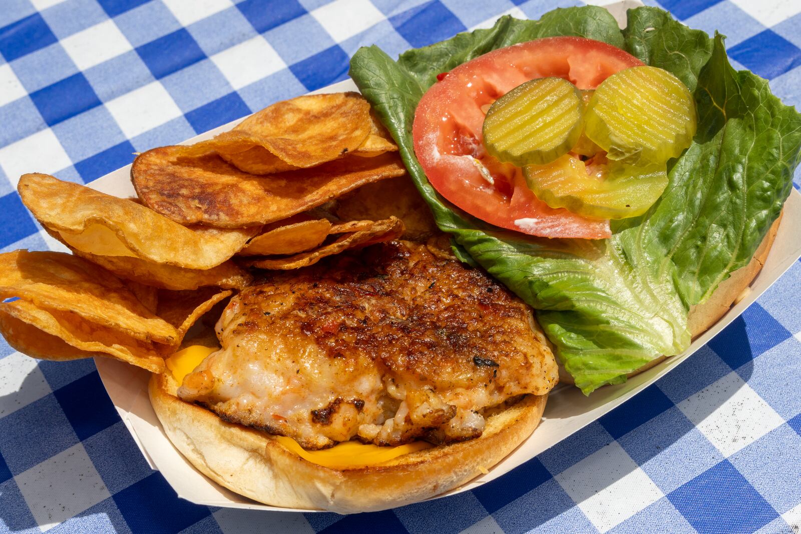 Beth Shipman, formerly of Marshside Mama's, is back making shrimpburgers, this time out of a food truck on the grounds of the Daufuskie Island Rum Co. distillery in Daufuskie Island, South Carolina. (AJC Photo/Katelyn Myrick)