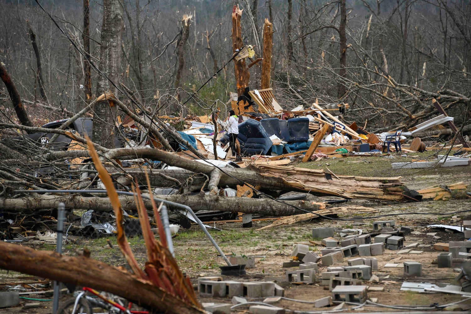 Photos: Tornadoes leave path of death, destruction in parts of Southeast