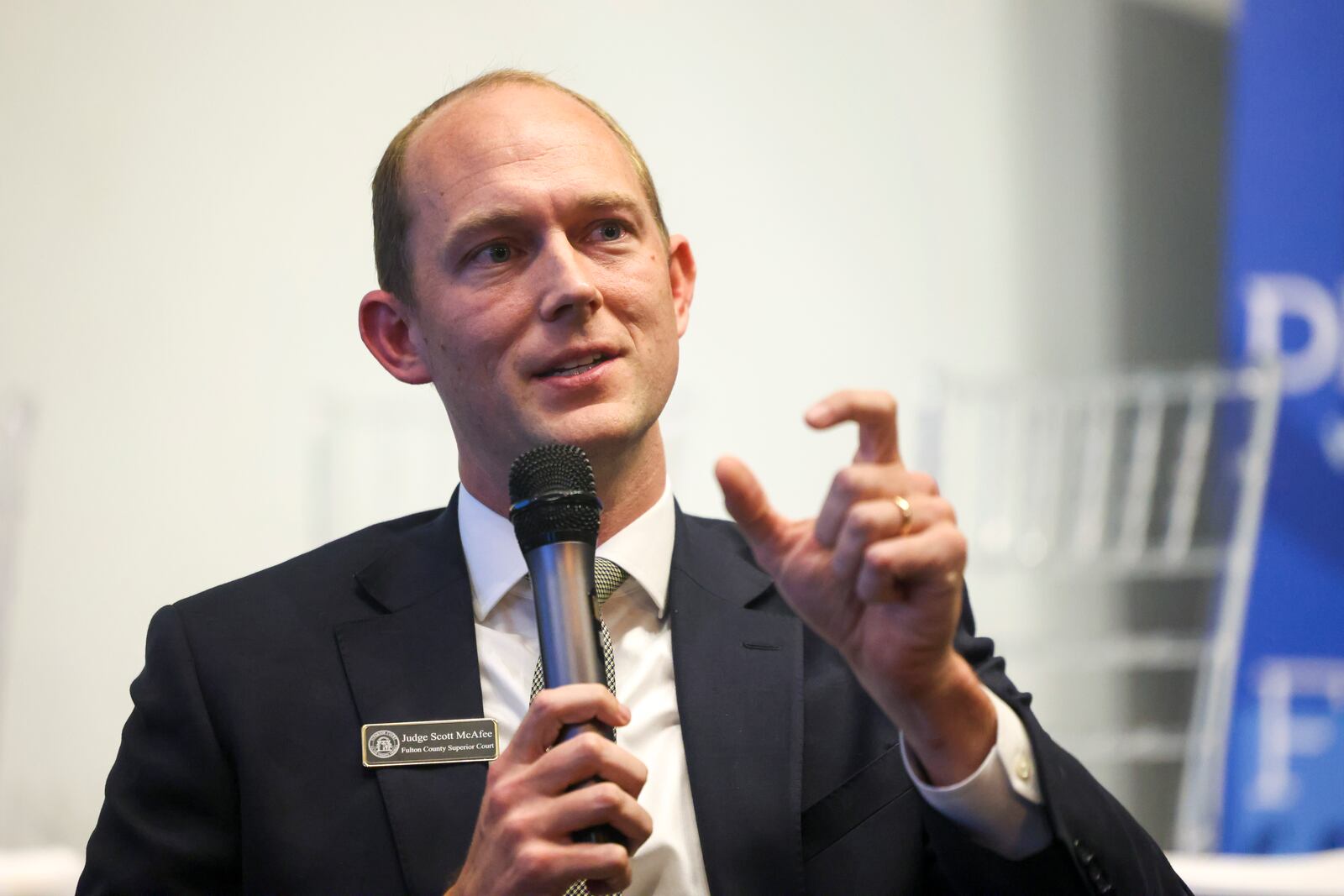 Fulton County Superior Court Judge Scott McAfee, nonpartisan, speaks during the 2024 Town Hall for North Fulton Democratic and Nonpartisan Candidates at Memories Event Space, Tuesday, April 30, 2024, in Johns Creek, Ga.  (Jason Getz / AJC)
