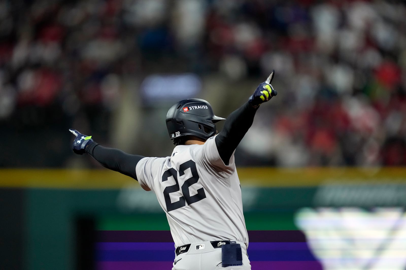 New York Yankees' Juan Soto celebrates after hitting a two-run home run against the Cleveland Guardians during the first inning in Game 4 of the baseball AL Championship Series Friday, Oct. 18, 2024, in Cleveland. (AP Photo/Godofredo A. Vásquez)