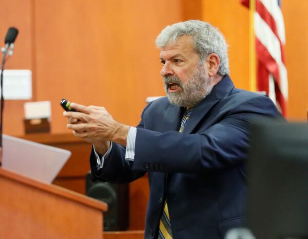 September 26, 2019 - Decatur -  Defense attorney Don Samuel's describes how Robert Olsen ordered Anthony Hill to stop during  his opening statement. The murder trial of former DeKalb County Police Officer Robert "Chip" Olsen began as attorneys worked to strike a jury this morning.  Opening statements are expected later today.  Olsen is charged with murdering  war veteran Anthony Hill.  Bob Andres / robert.andres@ajc.com