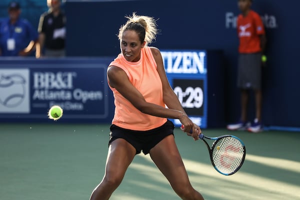 Madison Keys returns a shot to Venus Williams during the special women's exhibition tennis match at the BB&T Atlanta Open Tournament, Sunday, July 21, 2019, in Atlanta. BRANDEN CAMP/SPECIAL