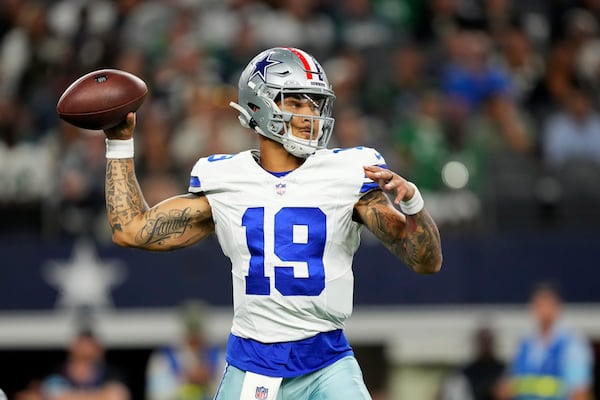 Dallas Cowboys quarterback Trey Lance throws a pass in the second half of an NFL football game against the Philadelphia Eagles in Arlington, Texas, Sunday, Nov. 10, 2024. (AP Photo/Jeffrey McWhorter)