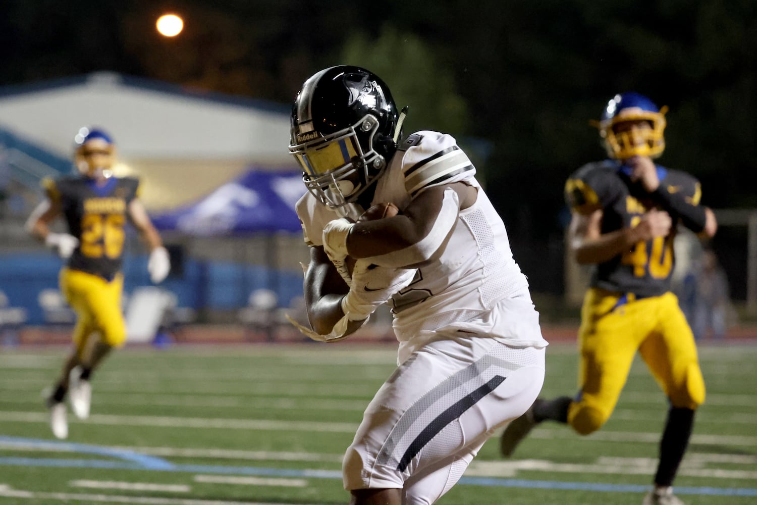 Sept. 25, 2020 - Johns Creek, Ga: Alpharetta running back Tylan Johnson (6) catches a touchdown in the first half against Chattahoochee at Chattahoochee high school Friday, September 25, 2020 in Johns Creek, Ga.. JASON GETZ FOR THE ATLANTA JOURNAL-CONSTITUTION