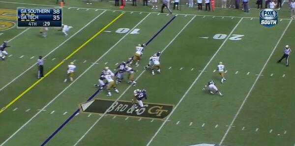 Thomas continues to roll away from Jackson. However, that introduces the next obstacle. Mason (70, at the 16) had been angling lineman Justice Ejike out to protect Thomas in the pocket. Now, as Thomas goes to the sideline, Ejike can peel off and pursue. The same holds for Dawson, who had lined up at the left linebacker spot and was being parried by right tackle Chris Griffin (72, on the line of scrimmage stripe). Had the blitz been picked up and Hill received the ball earlier, he would have almost 10 yards of space.