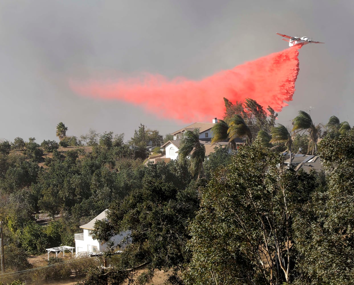 Photos: California wildfires burn thousands of acres, force evacuations