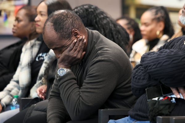 James Bodley reacts as fellow drivers ask the board of directors for safety changes following the shooting of the late MARTA bus driver Leroy Ramos during a public comment portion at the MARTA headquarters on Jan. 9 in Atlanta. Ramos was killed at the Decatur bus station on Swanton Way around 6:30 p.m. on Jan. 3. MARTA has said he was shot during a dispute over the $2.50 fare. (Jason Getz/AJC)
