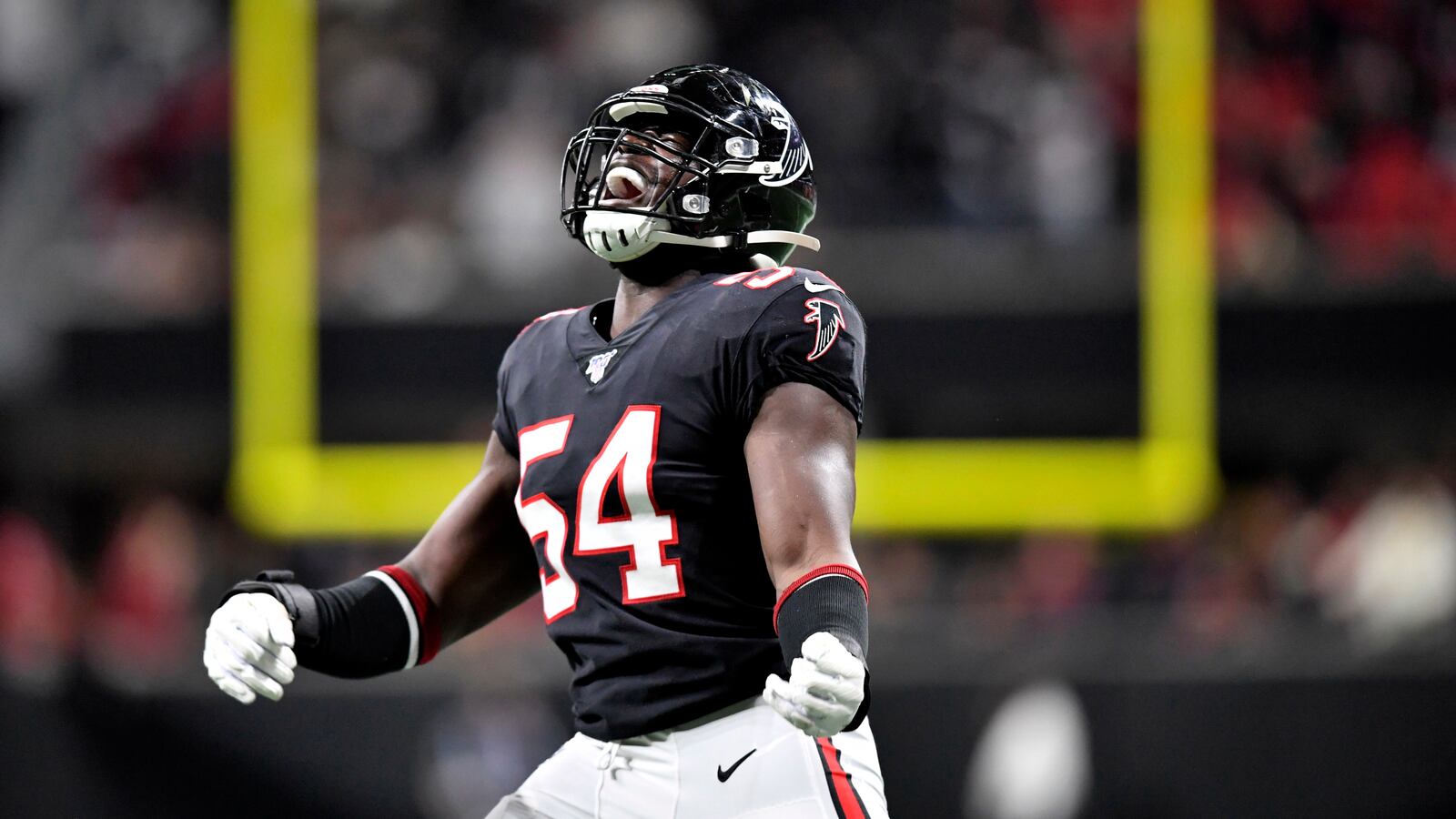 Atlanta Falcons linebacker Foye Oluokun (54) celebrates the recovery of the ball during a kickoff against the New Orleans Saints Thursday, Nov. 28, 2019, at Mercedes-Benz Stadium in Atlanta.