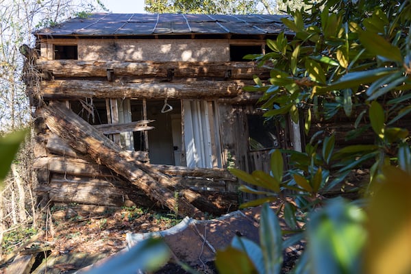 A view of the circa 1840 Power-Jackson Cabin in Marietta on Monday, December 4, 2023. The Cobb Landmarks + Historical Society hopes to restore and move the building. (Arvin Temkar / arvin.temkar@ajc.com)