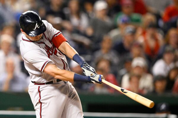 Atlanta Braves' Austin Riley hits a two-run home run during the eighth inning of the team's baseball game against the Washington Nationals, Wednesday, June 15, 2022, in Washington. The Braves won 8-2. (AP Photo/Nick Wass)