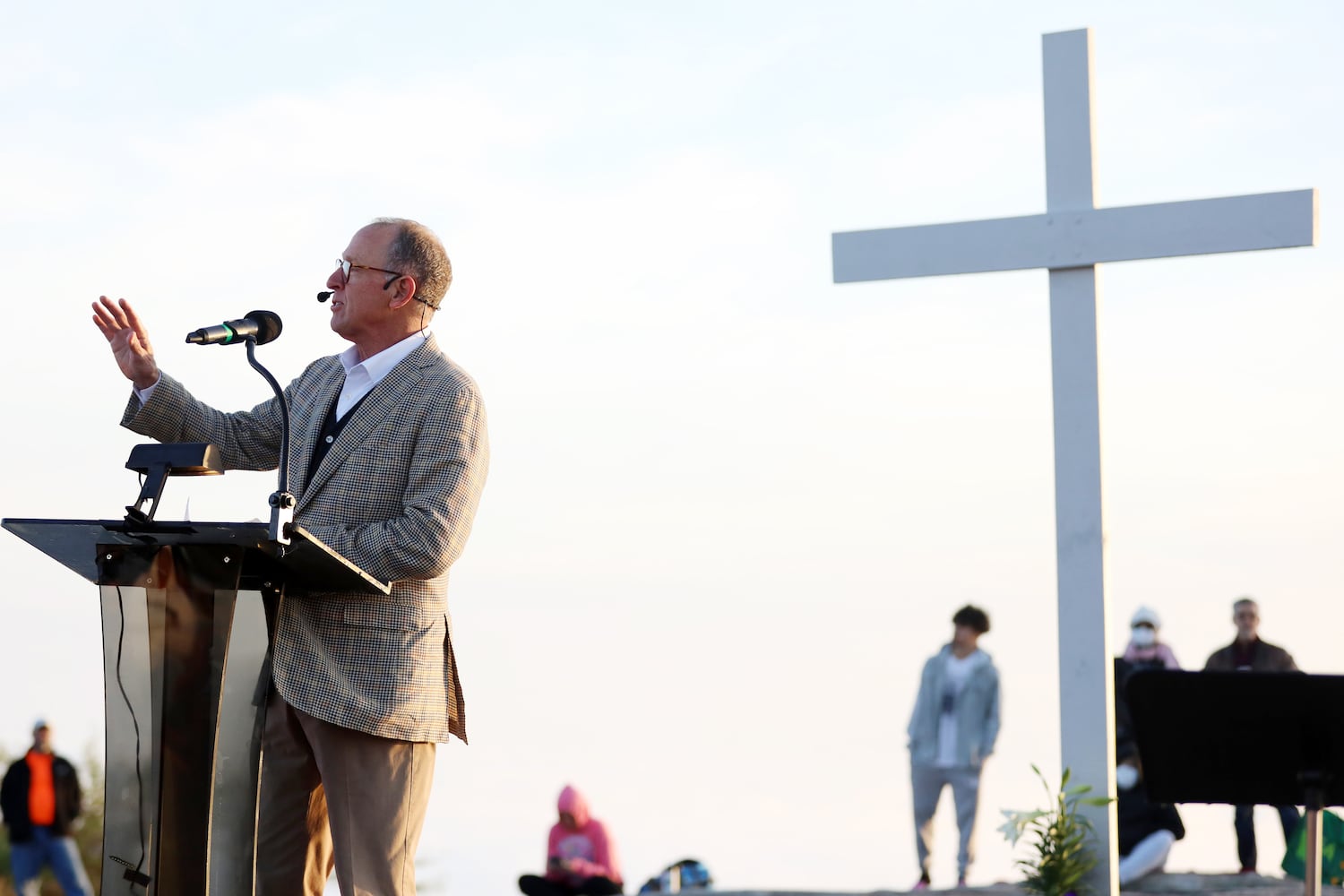 Pastor Bryant Wright delivers the message at the top of Stone Mountain during the 76th annual Easter Sunrise Service on Sunday, April 17, 2022. The popular event returned to the park after a two-year hiatus because of the pandemic. Miguel Martinez/miguel.martinezjimenez@ajc.com