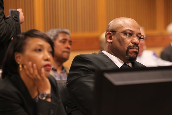 April 21, 2017, Atlanta, Georgia - Fulton Assistant District Attorney Clint Rucker listens to a statement from the defense at a court appearance for prominent Atlanta attorney Tex McIver in Atlanta, Georgia, on April 21, 2017. (HENRY TAYLOR / HENRY.TAYLOR@AJC.COM)