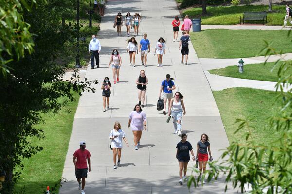 August 20, 2020 Athens - Students make their way as the University of Georgia started classes for the fall semester  on Thursday, August 20, 2020. (Hyosub Shin / Hyosub.Shin@ajc.com)