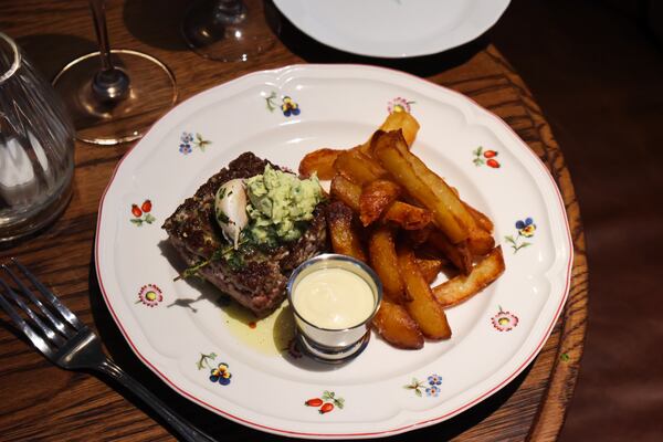 La Vie en Rose brings steak haché — ground rib-eye shaped into a square patty and cooked — with pomme frites and aioli. Courtesy of Little Sparrow