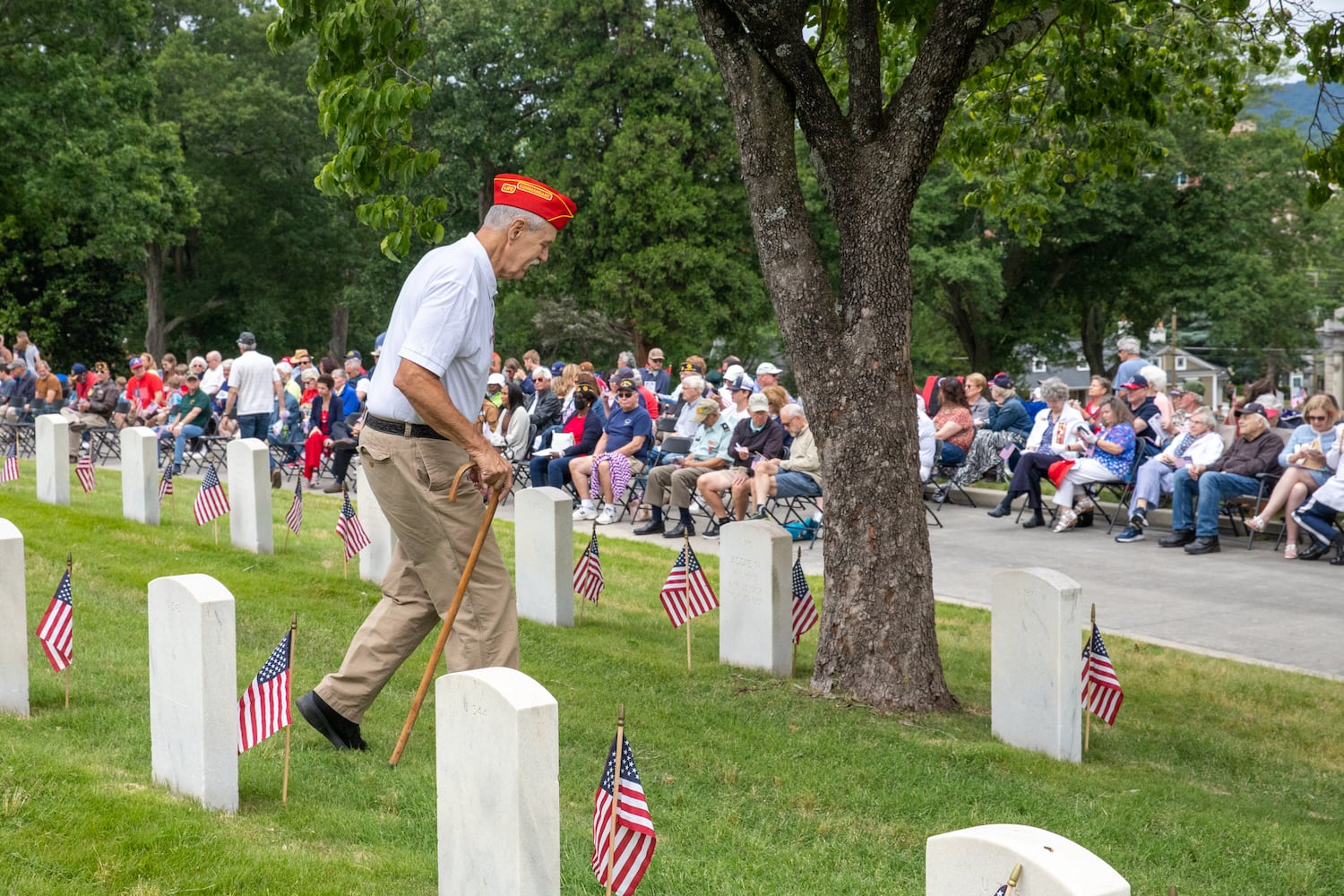 Marine veteran Doug Tasse heads to his seat before the 77th annual Memorial Day Observance formally begins at the Marietta National Cemetery on Monday, May 29, 2003.  (Jenni Girtman for The Atlanta Journal-Constitution)