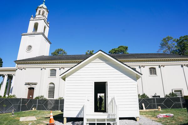 Artist, activist, and founder of The New Freedom Project, Charmaine Minniefield, is behind the "Praise House," under construction at Emory University's campus. (Photo by Olivia Bowdoin for the AJC).