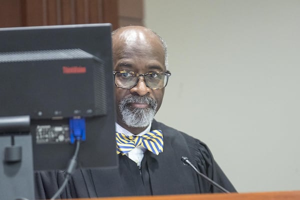 Atlanta Municipal Court Judge Herman Sloan works in his courtroom. He hoped that admitted prostitute Angela Dalton would receive aftercare when she completed her stay at a sex trafficking victim treatment center, but she did not. ALYSSA POINTER / ALYSSA.POINTER@AJC.COM