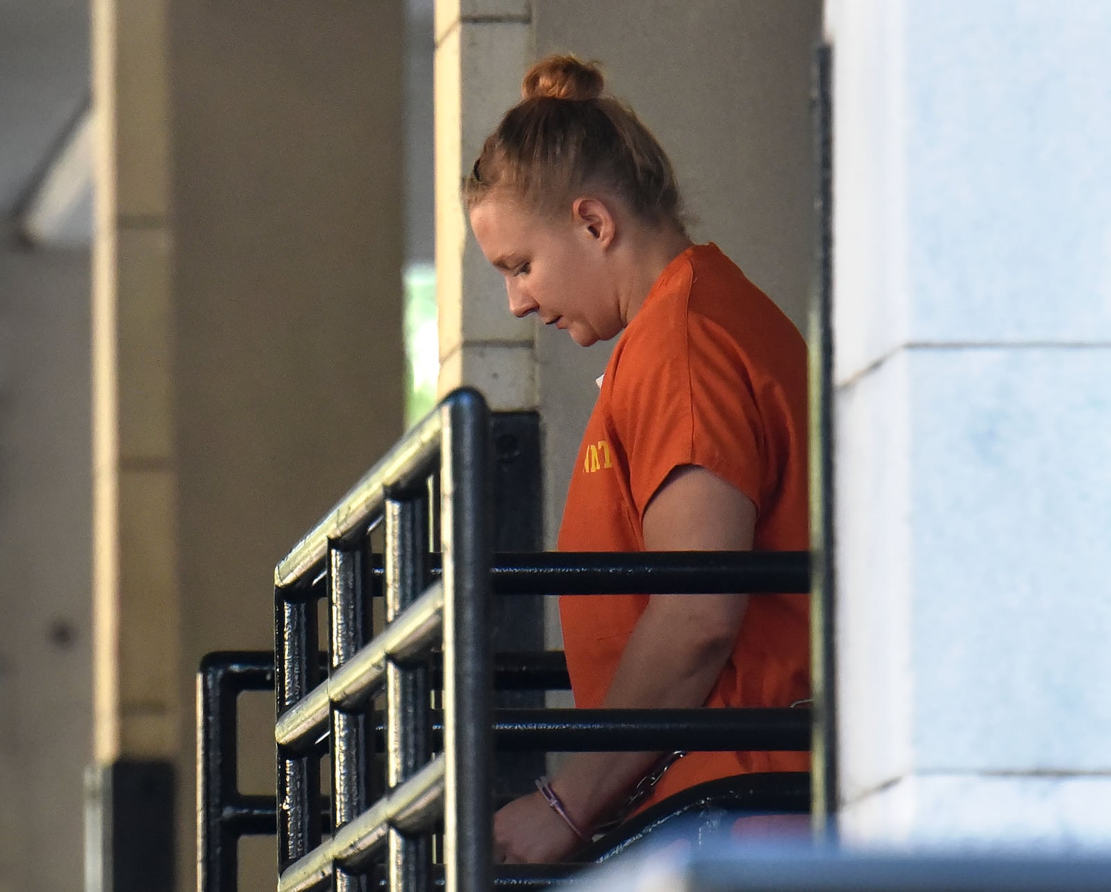 In February, accused leaker Reality Winner injured her knee in a fall while being transported to a court hearing. She is seen here leaving the federal courthouse in Augusta following a June bond hearing. HYOSUB SHIN / HSHIN@AJC.COM