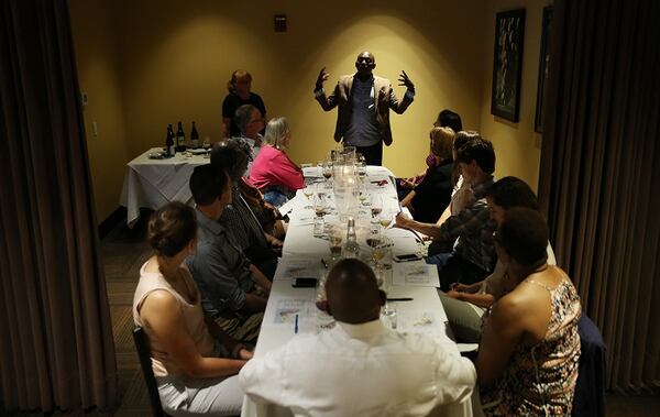 Enoch Shully, owner of Bin 36, talks about South African wines with a group at the wine restaurant on Tuesday, Aug. 8, 2017, in Chicago, Ill. (John J. Kim/Chicago Tribune/TNS)