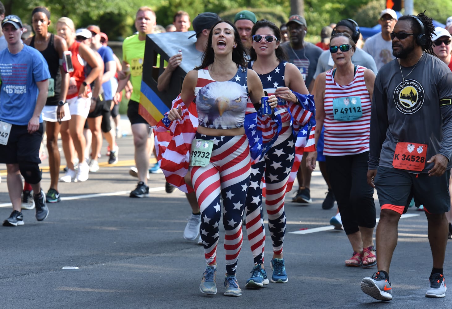 Runners show fashion flair during AJC Peachtree Road Race