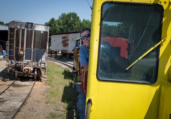 Engineer Gary Cullen drives the restored 1948 General Electric 5 ton locomotive during its dedication at the museum's Southeastern Railway Museum in Duluth, GA Saturday, June 11, 2016. STEVE SCHAEFER / SPECIAL TO THE AJC