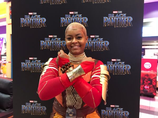  Atlanta's Alexandra Gainous, an actor and model, dressed up as General Okoye in "Black Panther" played by Danai Gurira, to a screening of the film Tuesday night at Regal Cinemas in Atlantic Station. CREDIT: Rodney Ho/rho@ajc.com