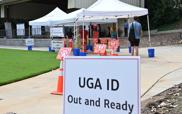 August 20, 2020 Athens - Students and faculty members wait in line at COVID Surveillance Asymptomatic Testing center at Legion Field as the University of Georgia started classes for the fall semester on Thursday, August 20, 2020. (Hyosub Shin / Hyosub.Shin@ajc.com)