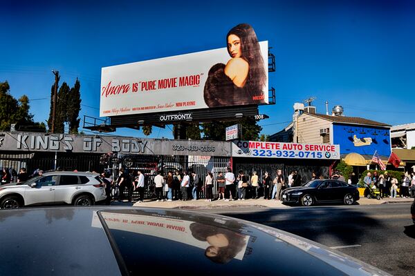 Anora movie fans stretch down Melrose Blvd. to line up for a Pop-Up event for the movie Anora on Saturday, Nov. 9, 2024 in Los Angeles. (AP Photo/Richard Vogel)