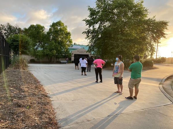 About 20 people waited in line at Best Friend Park in Gwinnett County.