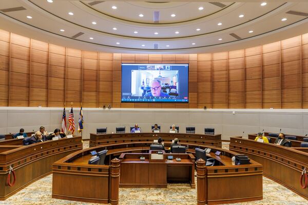 The Fulton County Board of Registration and Elections meets at the Assembly Hall of the Fulton County Government Center to certify the June general primary run-off election on Monday, June 27, 2022. (Arvin Temkar / arvin.temkar@ajc.com)