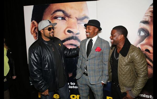 Ice Cube, left, shown with Will Packer and Kevin Hart at the Atlanta premiere of "Ride Along." AJC file photo